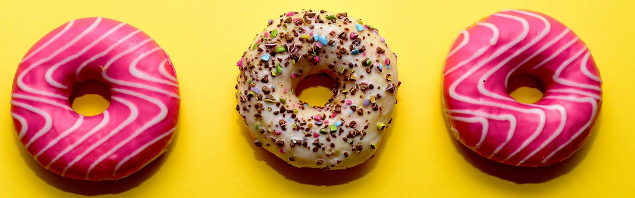 A variety of iced and glazed donuts